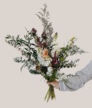 Wild textured bouquet with baby blue eucalpytus, limonium filler, anemone and scabiosa